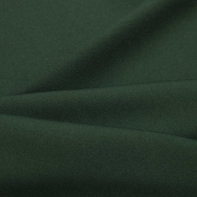 Ткань костюмная 21010 2076, 225 гр/м2, шир.150см, цвет т.зеленый - купить в Пензе. Цена 390.73 руб.